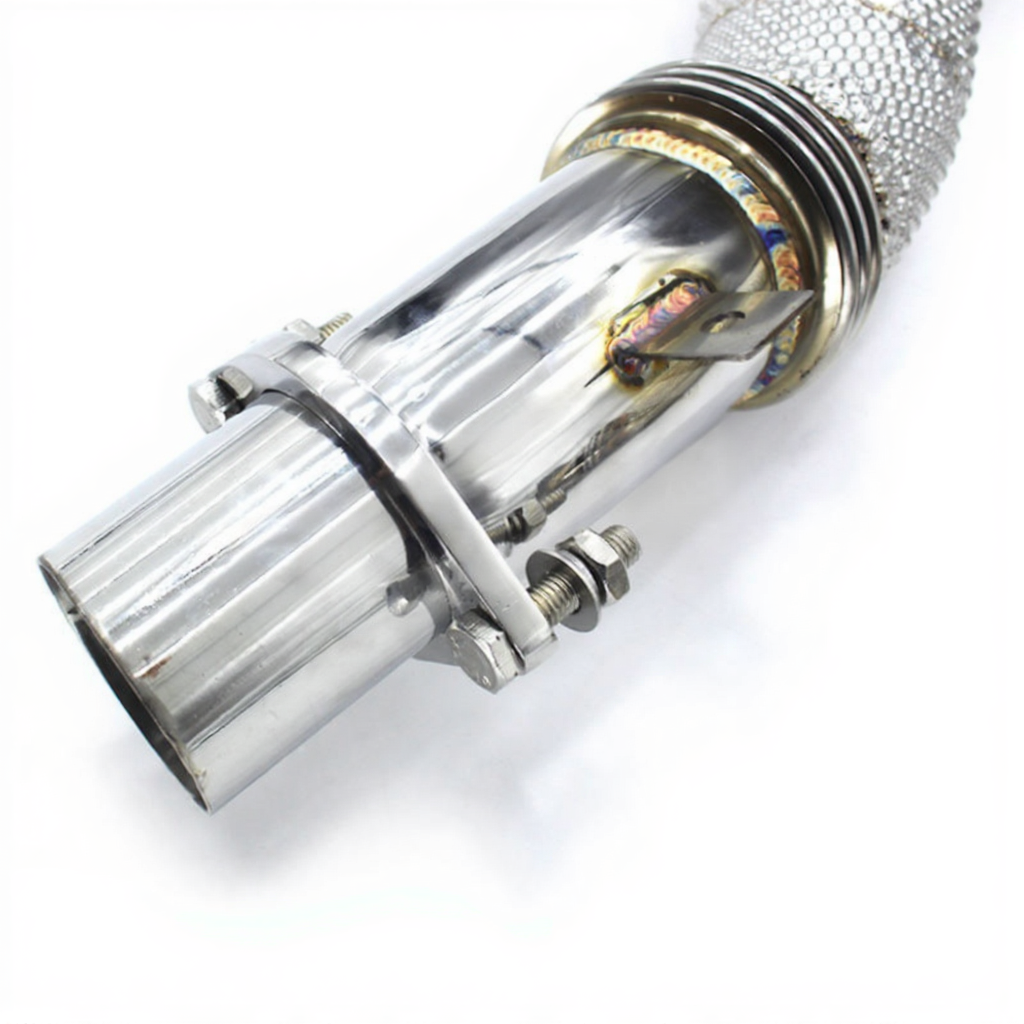Close-up of a metallic exhaust pipe on a white background