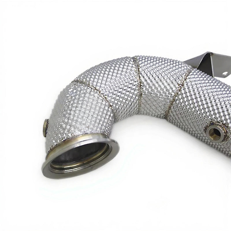 Metallic exhaust pipe with mesh design on a white background